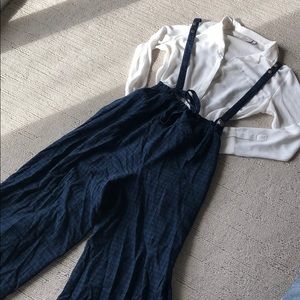Navy blue wide-leg cropped pant with suspenders